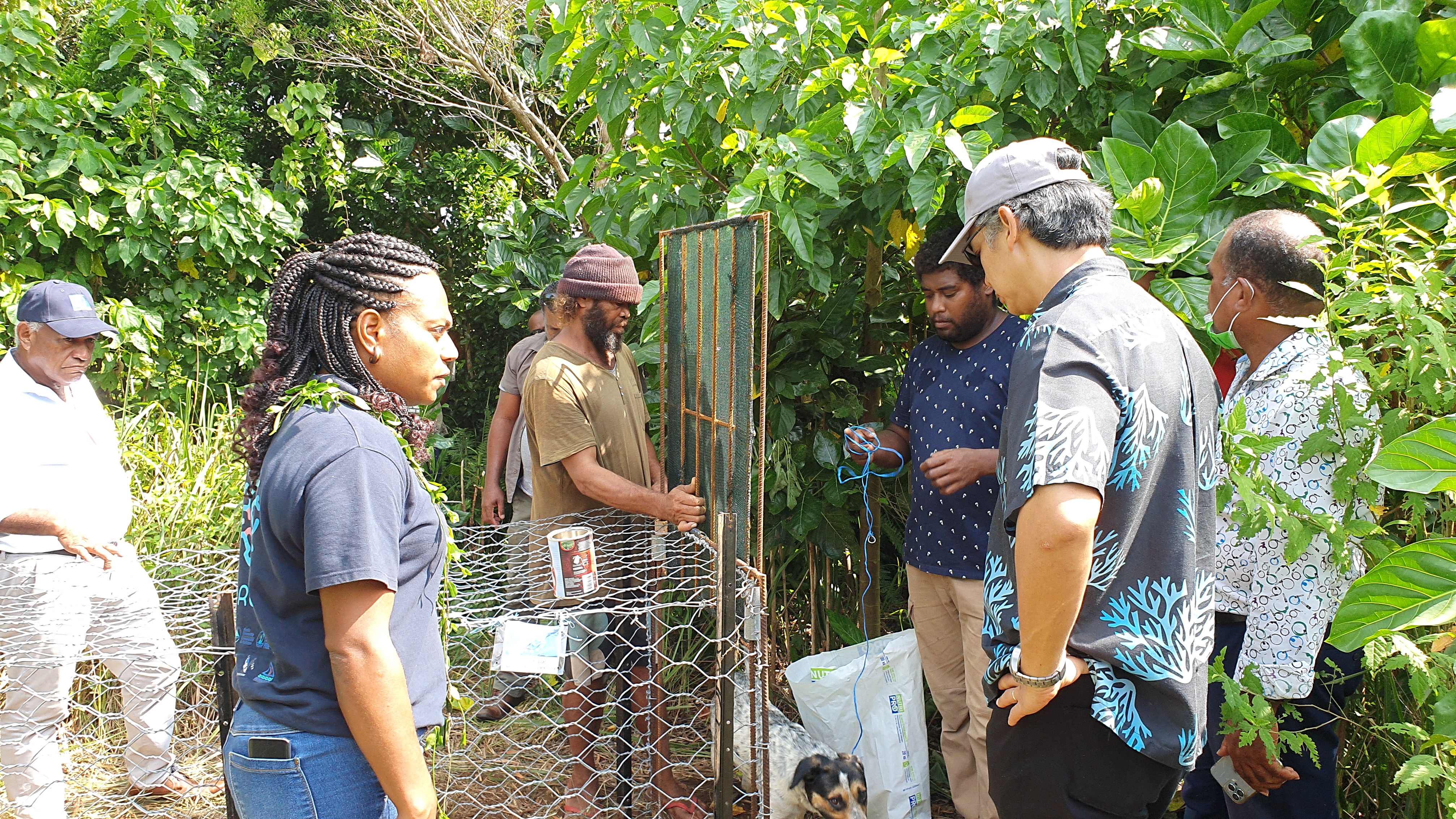 Demonstration of cage traps and rope snares to control invasive species.